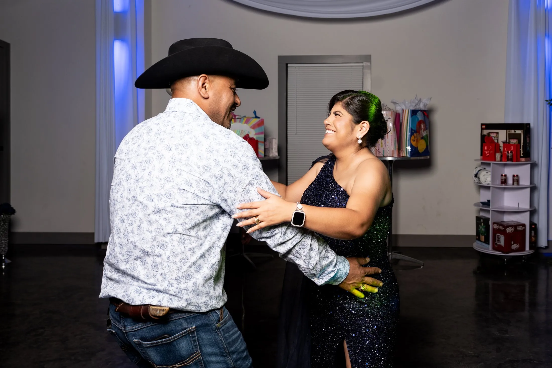 Couple dancing at the quinceañera reception