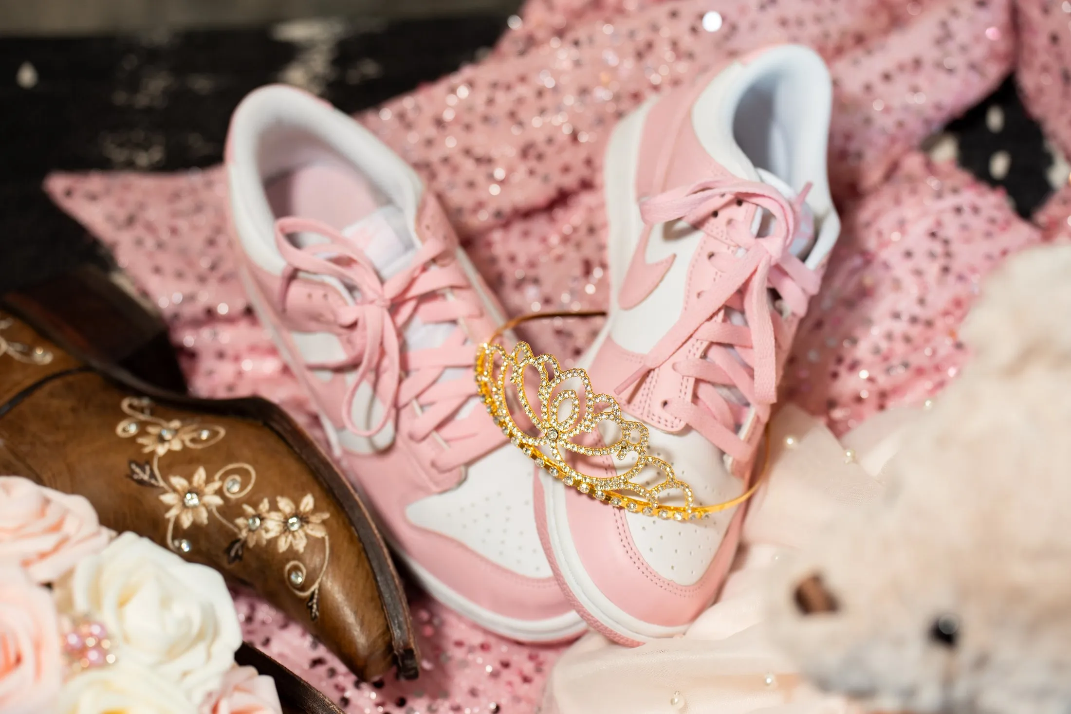 Pink sneakers, a gold tiara and cowgirl boots for the change of shoes at Hidden Acres Ranch in Hudson Oaks