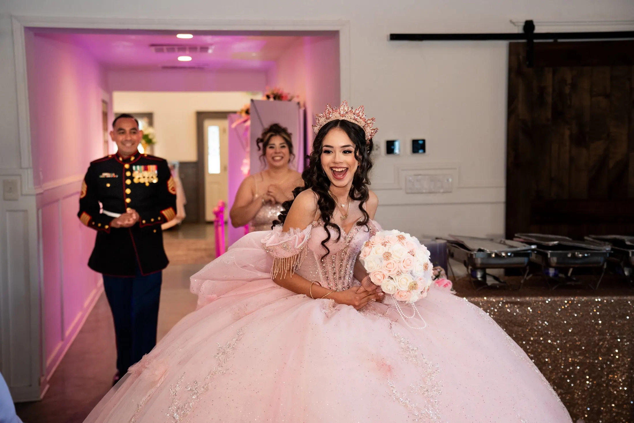 Rosalie’s grand entrance into the reception at Hidden Acres Ranch in Hudson Oaks, escorted by a Marine in dress blues