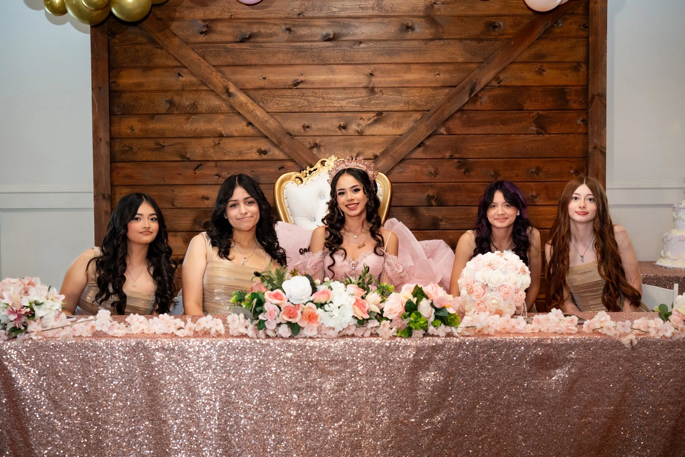 Rosalie at the head table with her court of honor at Hidden Acres Ranch in Hudson Oaks