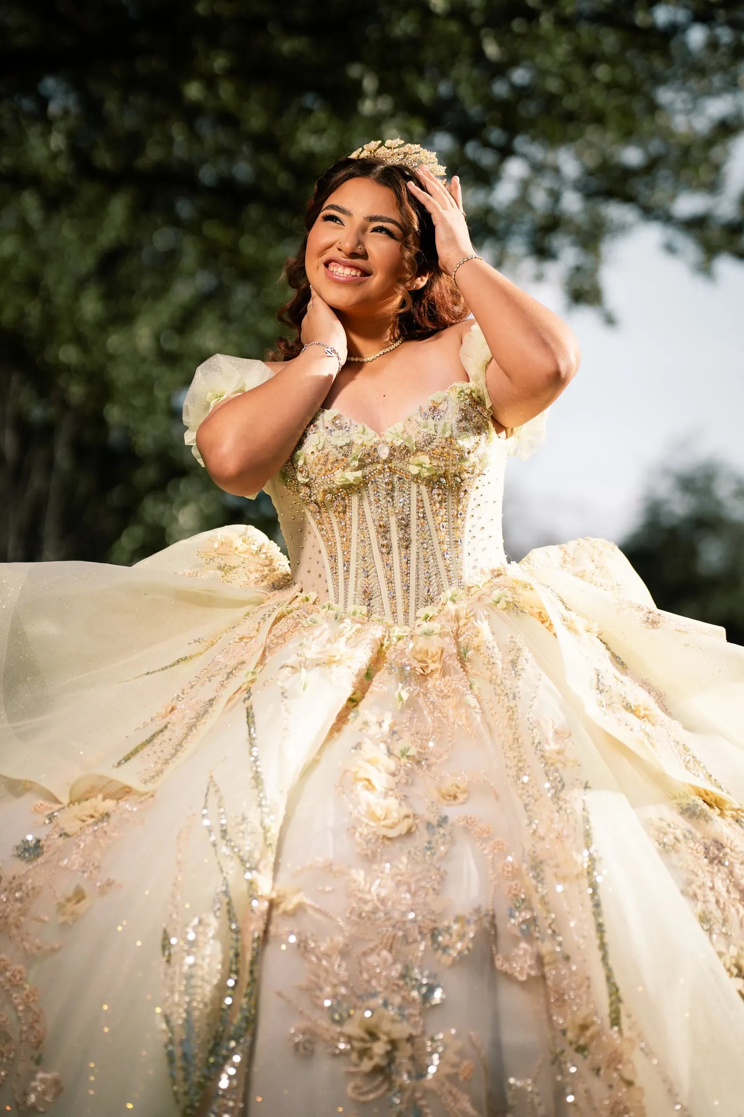 K’talyn in her champagne-gold Sweet 16 quince gown and crown at the Dallas Arboretum and Botanical Garden