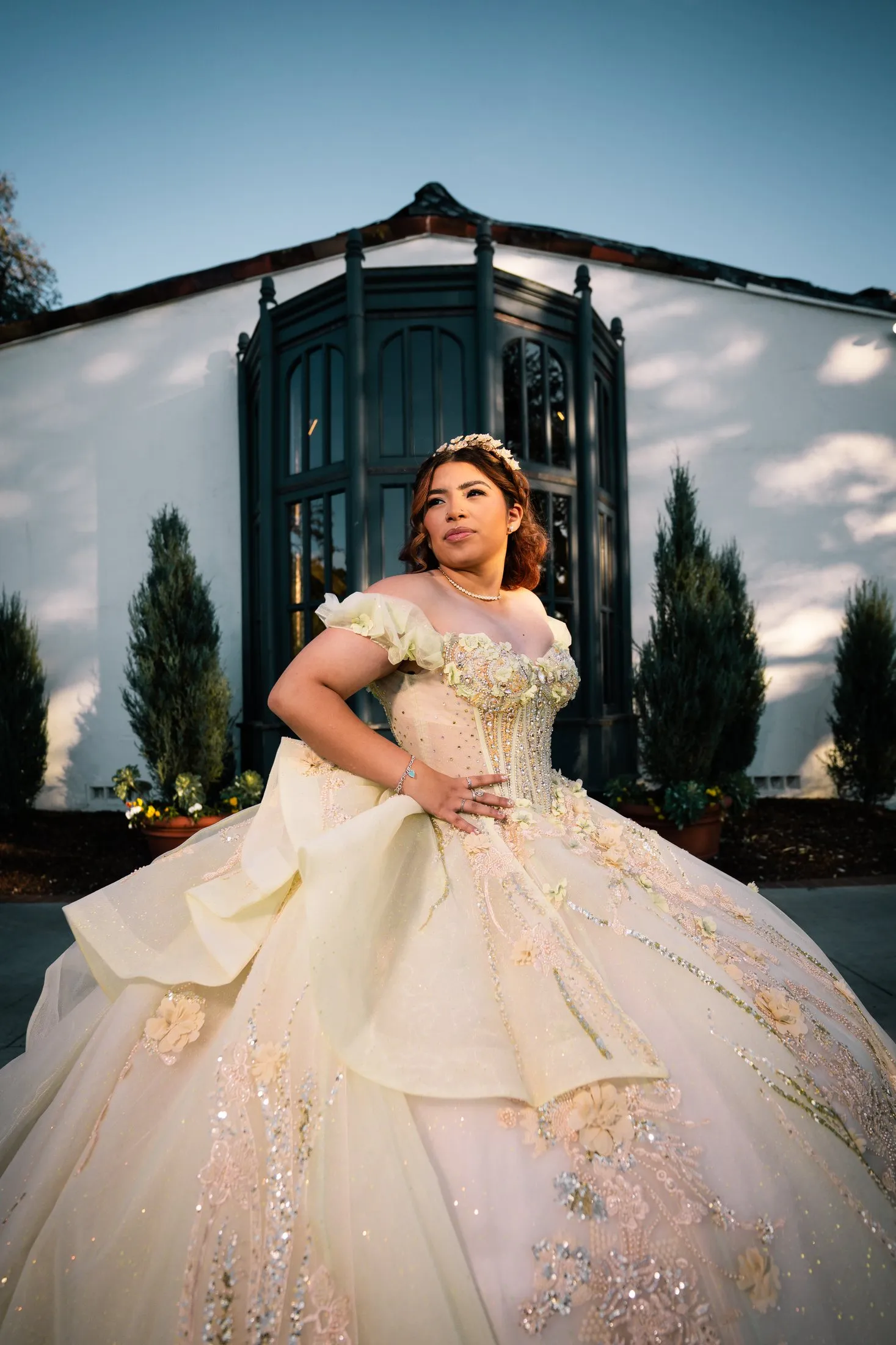 Sweet 16 photoshoot in front of a historic white house and cypress trees at the Dallas Arboretum