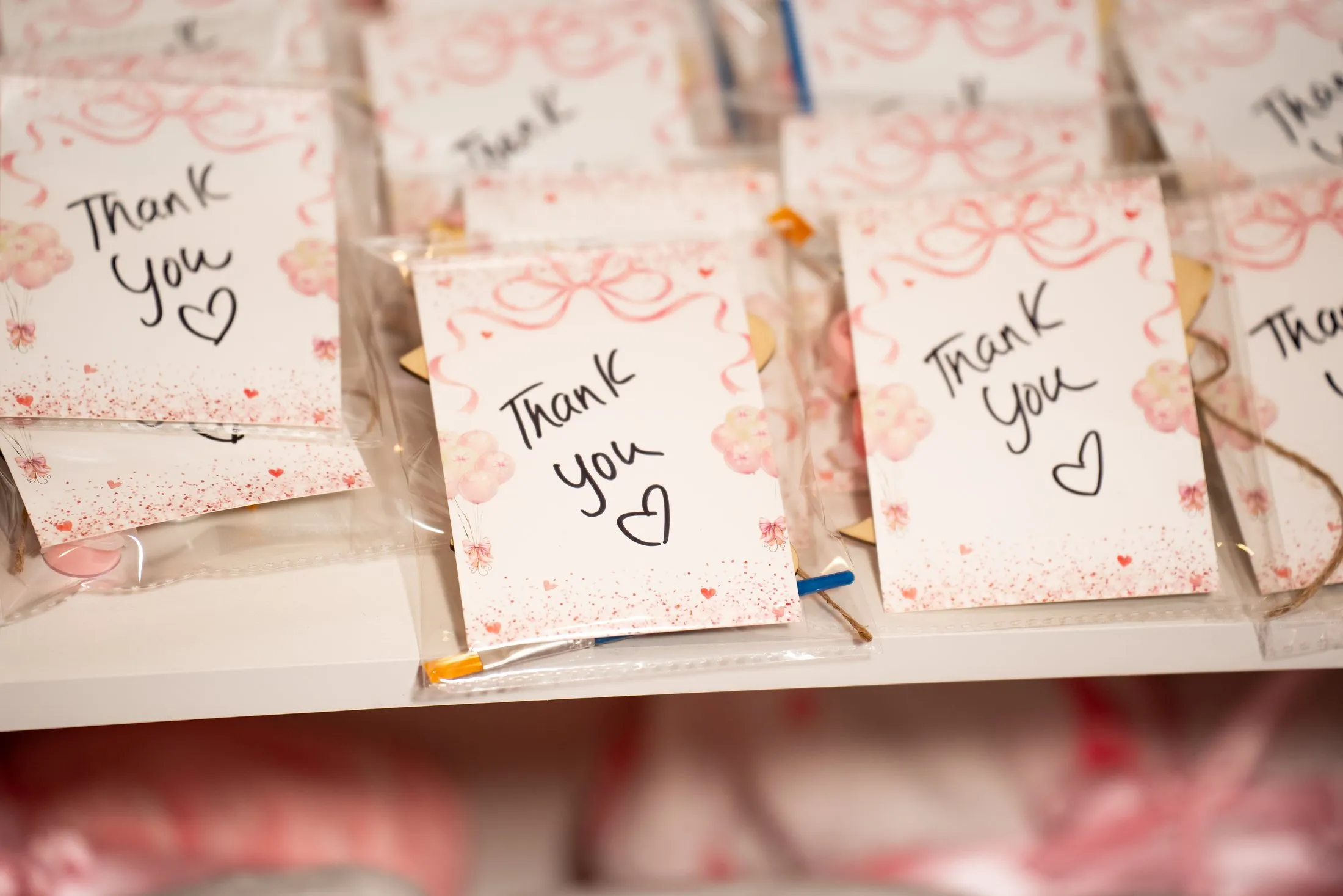 Handwritten “Thank you” cards for the quinceañera party favors at Hidden Acres Ranch in Hudson Oaks